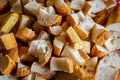 A crouton is a piece of rebaked bread, often cubed and seasoned.