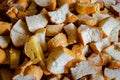 A crouton is a piece of rebaked bread, often cubed and seasoned.