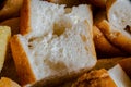 A crouton is a piece of rebaked bread, often cubed and seasoned.