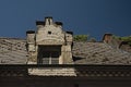 Crow stepped gable window and roof of an oldd flemish house