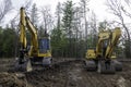 CROW WING CO, MN - 10 MAY 2023: Front view of two Komtsu excavators