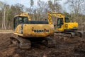 CROW WING CO, MN - 10 MAY 2023: Two used Komtsu excavators from behind