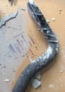 Crowbar on the old drywall. Stamp with an inscription in Russian Ã¢â¬ÅLeningrad plant of plaster and marble products. . Gr