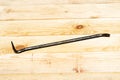 Crowbar on the Planks Royalty Free Stock Photo