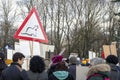 Crowd of activists at Animal Advocacy event with signs and banners in hands protest against animal abuse