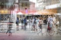 Crowd of anonymous people at a shopping mall in the big city, ab