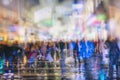 Crowd of anonymous people walking on busy night  city street Royalty Free Stock Photo