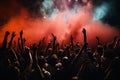 Crowd cheering at a music festival, hands raised up in the air Royalty Free Stock Photo