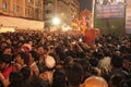 Crowd cheers for Large statues of blessing Ganesha in procession Royalty Free Stock Photo