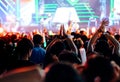 Crowd clap or hands up at concert stage lights Royalty Free Stock Photo