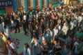 Crowd on a colorful sand carpet at the Holy Week