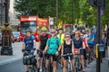 A crowd of cyclists waiting at traffic lights in London