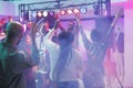 Crowd dancing and enjoying discotheque Royalty Free Stock Photo