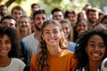 A Crowd Of Diverse People Standing And Smiling Together In A Park Standard