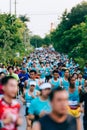 Crowd and diversity of people, men and women in the morning are running mini, half and marathon in the park