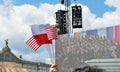 Crowd enthusiastically wave flags. Krasinski Square.