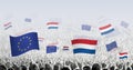 Crowd with flag of European Union and Netherlands, people of Netherlands with flag of EU