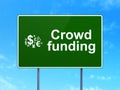 Crowd Funding and Finance Symbol on road sign Royalty Free Stock Photo