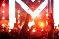 Crowd of hands up concert stage lights Royalty Free Stock Photo