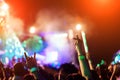 Crowd of hands up lovers concert stage lights Royalty Free Stock Photo