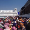 Crowd of indian sikh people in the golden temple, amritsar, india