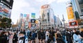 Crowd of Japanese people, commuter, traveler walk cross road at Shibuya scramble crossing Royalty Free Stock Photo