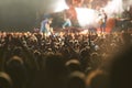 Crowd, live concert and stage with dancing audience as music festival for entertainment, performance or carnival. People Royalty Free Stock Photo