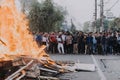 Crowd making fire on the street at CAB Protest in Guwahati, Assam, India