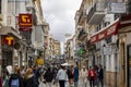 crowd of many tourists and shoppers