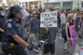 Crowd of multi-ethnic men and woman walking on street protest against G-20 meeting in Toronto