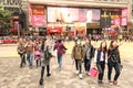 Crowd of multiracial people crossing Nathan Road in Hong Kong Royalty Free Stock Photo