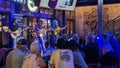 A crowd in a music bar on Broadway, Downtown Nashville, enjoys live music