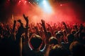 crowd at a music festival, hands raised up in front of the stage, Crowd cheering at a live music concert and raising hands up, AI Royalty Free Stock Photo