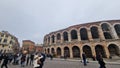 Crowd near the arena of Verona, the Roman amphitheater in Verona, Italy