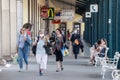 Crowd of Old women walking in the train station of Ljubljana, some wearing a facemask, during coronavirus covid 19 crisis