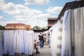 Crowd packing on the Subotica market, also referred as Buvlak, on the textile, fabrick and curtains section.