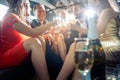 Crowd of party people in a limo with drinks Royalty Free Stock Photo