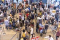 Crowd passengers with luggage in queue at check-in counter at airport, Thailand