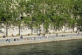 Crowd of people on the banks of river Seine