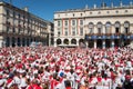 Crowd of people dressed in white and red at the Summer festival in Bayonne