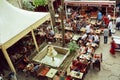 Crowd of people drinking coffee in outdoor cafe in popular touristic area of turkish capital Royalty Free Stock Photo