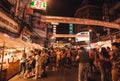 Crowd of people eating street food and walking around China Town during the Chinese New Year