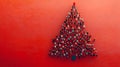 Crowd of People Forming Christmas Tree Shape, Isolated on Red Background, with Copy Space Royalty Free Stock Photo