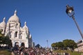 Crowd of people in front of the Sacre-coeur basilica on Montmartre, Paris