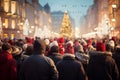 Crowd of people going to Christmas market, walking in festive illuminated street, buying presents, preparing for Royalty Free Stock Photo