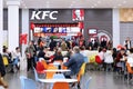 People in the KFC restaurant in the shopping center