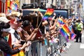 Crowd of people with LGBT colors celebrates the annual Pride Parade