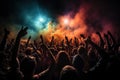 A crowd of people at a live event, concert or party holding hands and smartphones up. Royalty Free Stock Photo