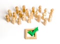 A crowd of people looks at a green check mark. Voting and election concept. Referendum, revolution. Forcible overthrow. Royalty Free Stock Photo