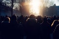 Crowd of people protesting together walking in the city, view from behind, Generative AI